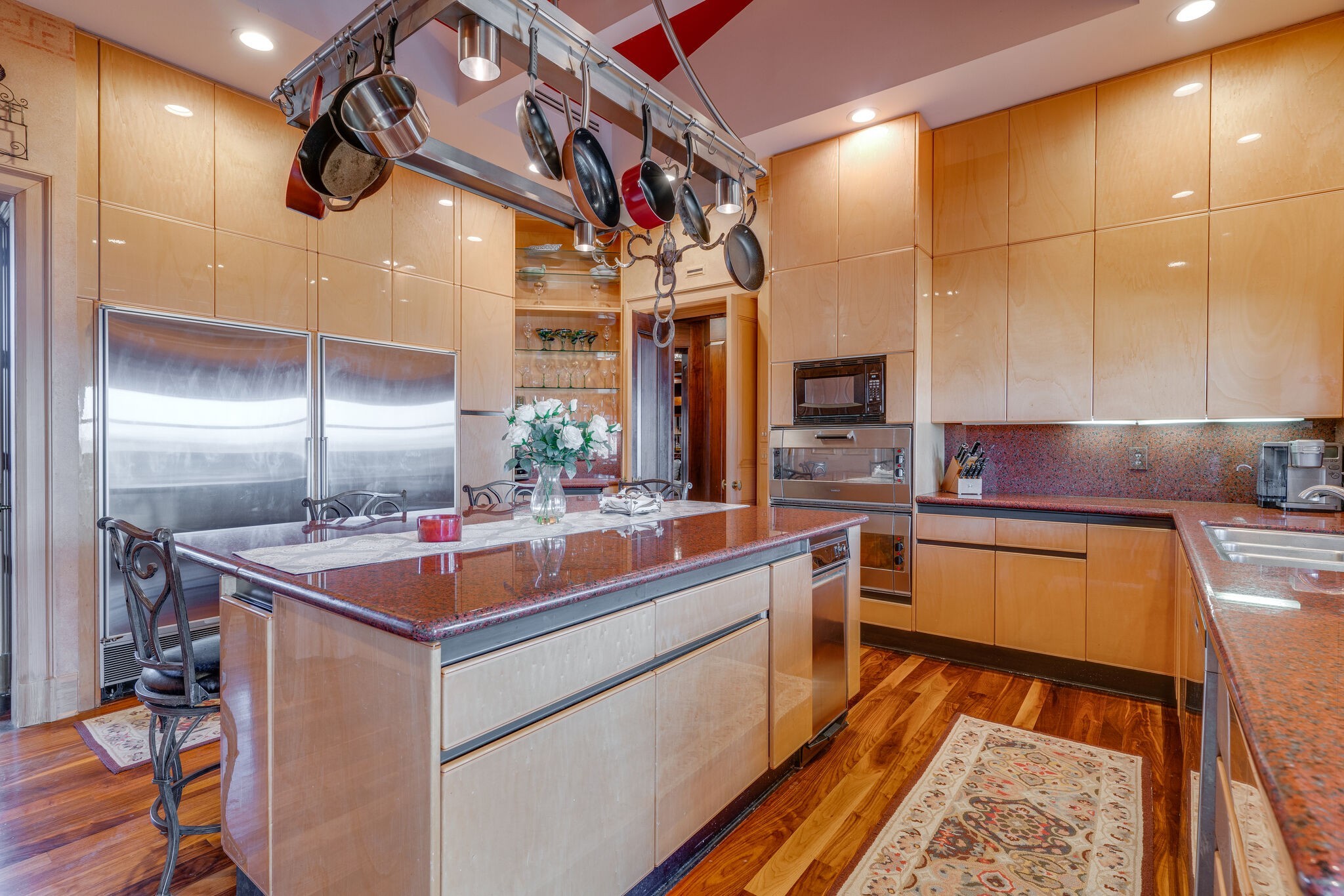 6300 Cairo Bend Road Lebanon, TN 37087 - Photo 14 of 50 a kitchen with stainless steel appliances granite countertop a sink and cabinets