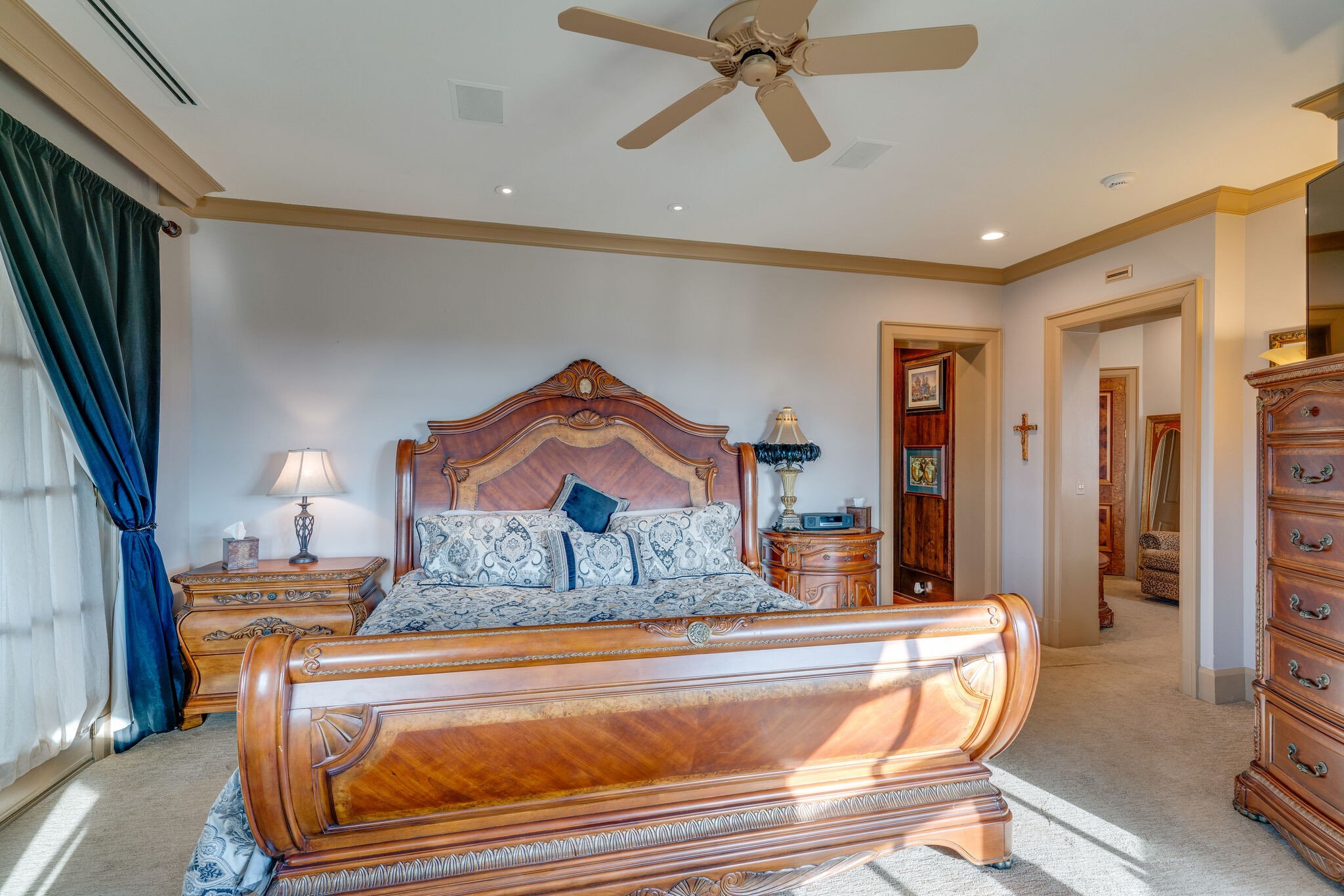 6300 Cairo Bend Road Lebanon, TN 37087 - Photo 19 of 50 a room with a bed and a chandelier