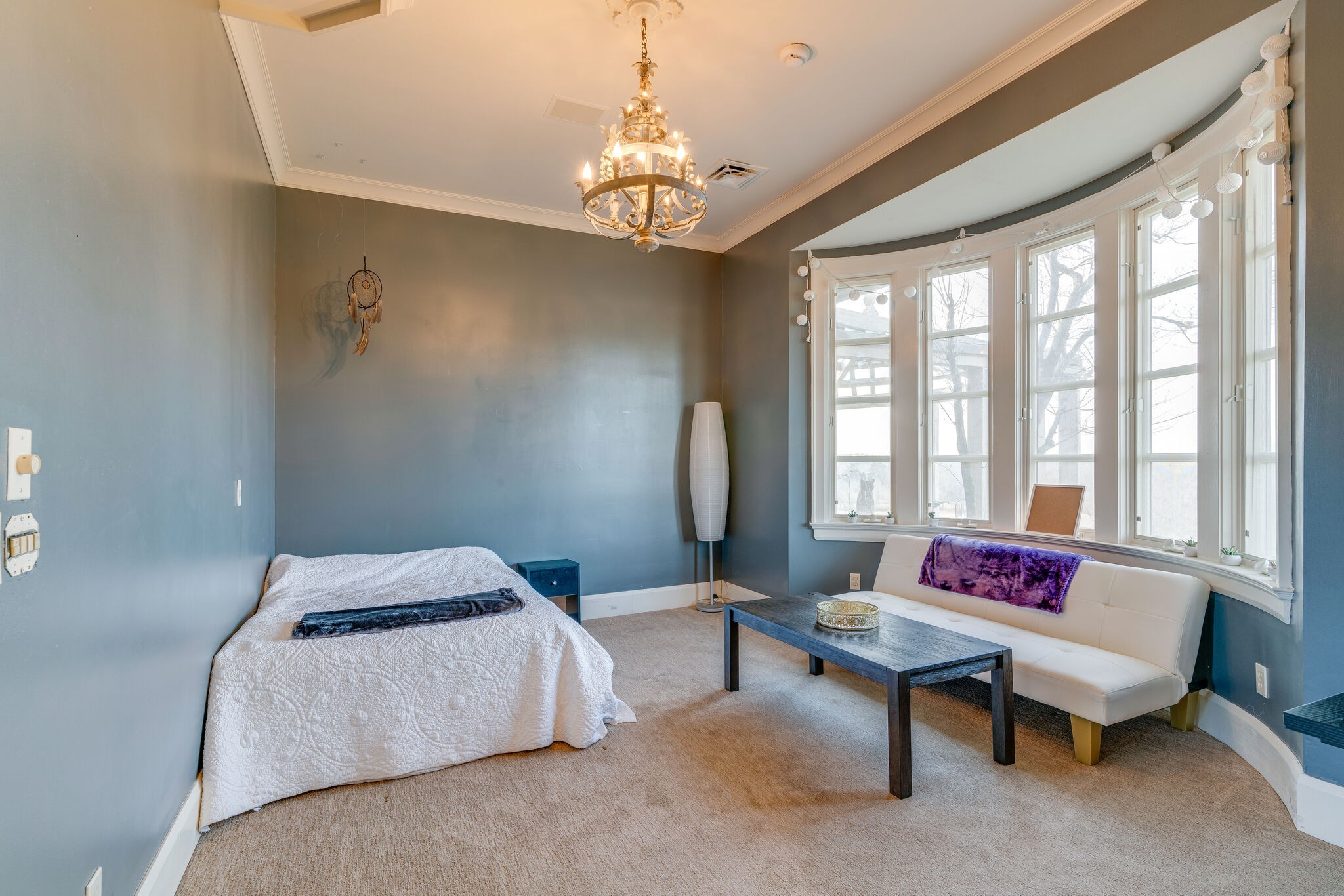 6300 Cairo Bend Road Lebanon, TN 37087 - Photo 25 of 50 a living room with furniture and a chandelier