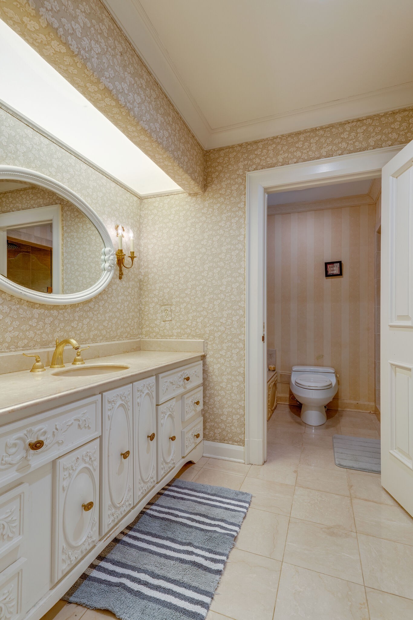 6300 Cairo Bend Road Lebanon, TN 37087 - Photo 26 of 50 a spacious bathroom with a double vanity sink toilet and a mirror