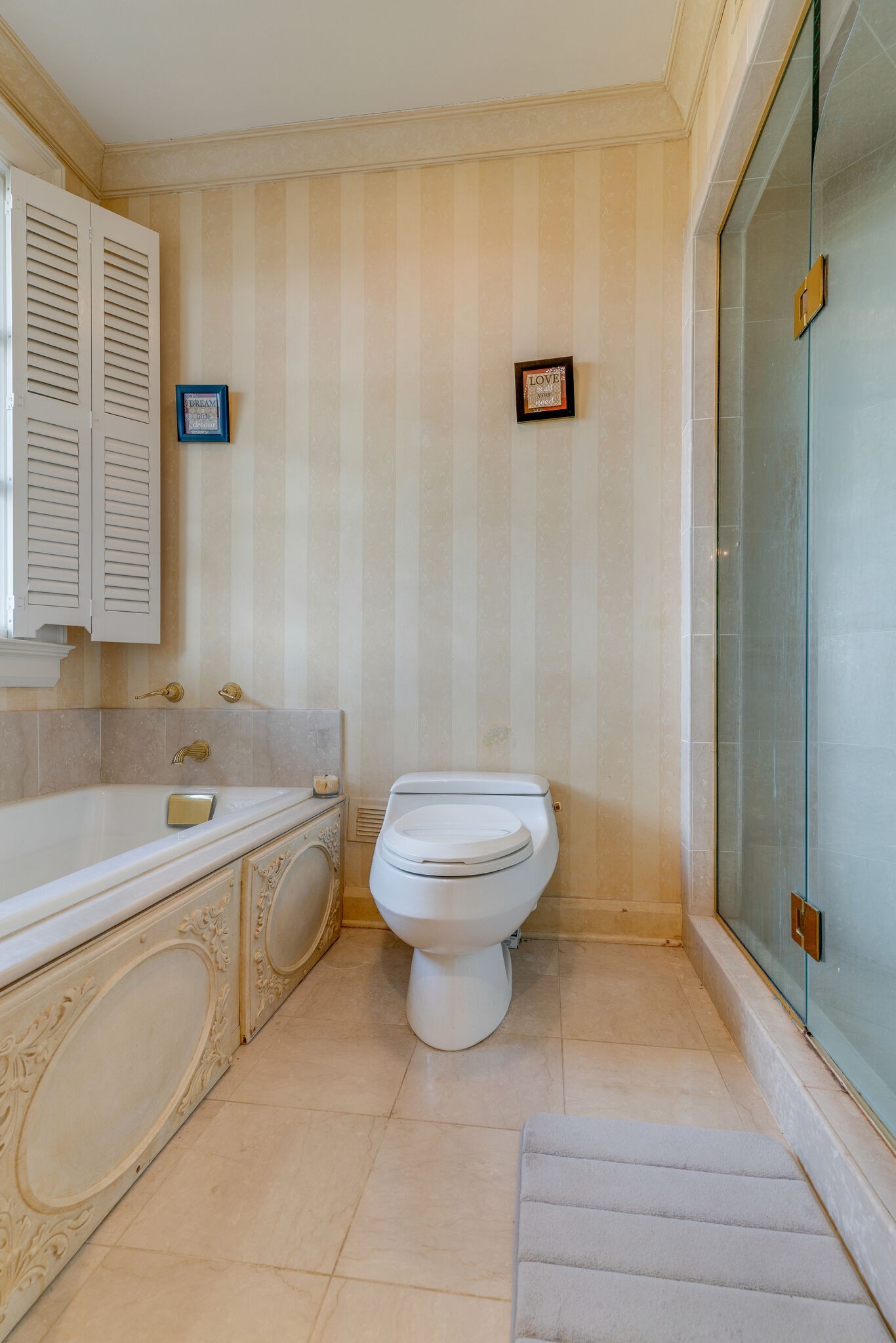6300 Cairo Bend Road Lebanon, TN 37087 - Photo 27 of 50 a bathroom with a toilet a sink and bathtub