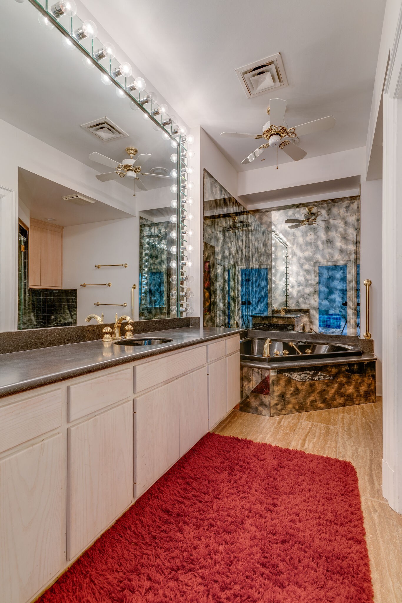 6300 Cairo Bend Road Lebanon, TN 37087 - Photo 35 of 50 a large kitchen with kitchen island a large counter space a sink stainless steel appliances and cabinets