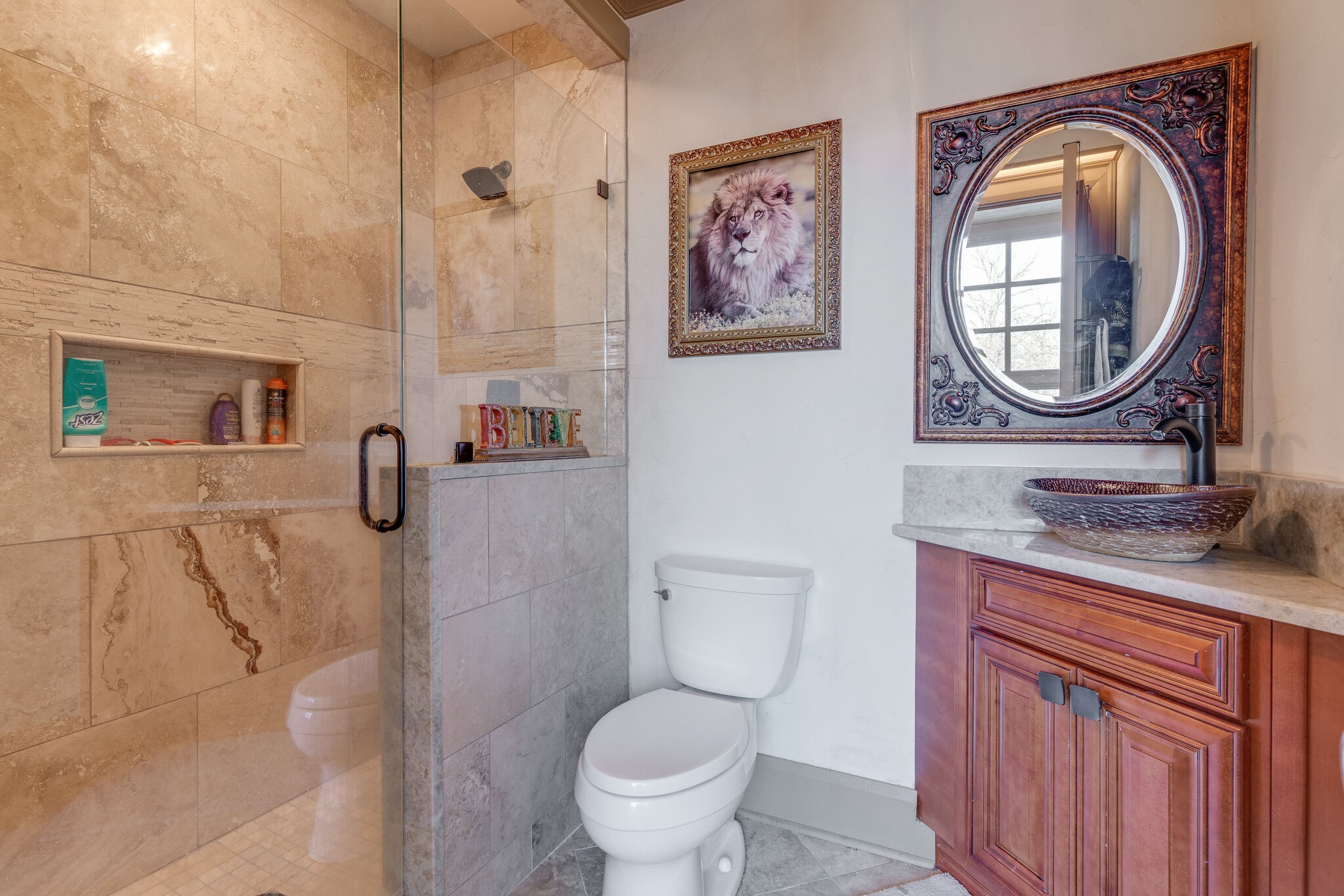 6300 Cairo Bend Road Lebanon, TN 37087 - Photo 38 of 50 a bathroom with a toilet a sink and a mirror