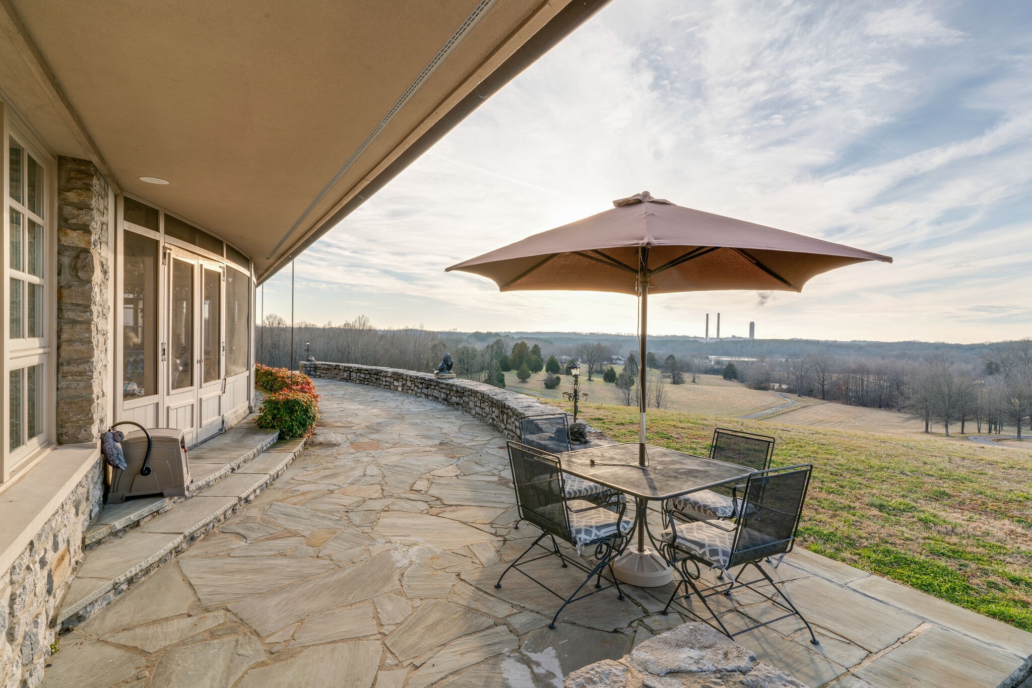 6300 Cairo Bend Road Lebanon, TN 37087 - Photo 43 of 50 a view of chairs and table under an umbrella
