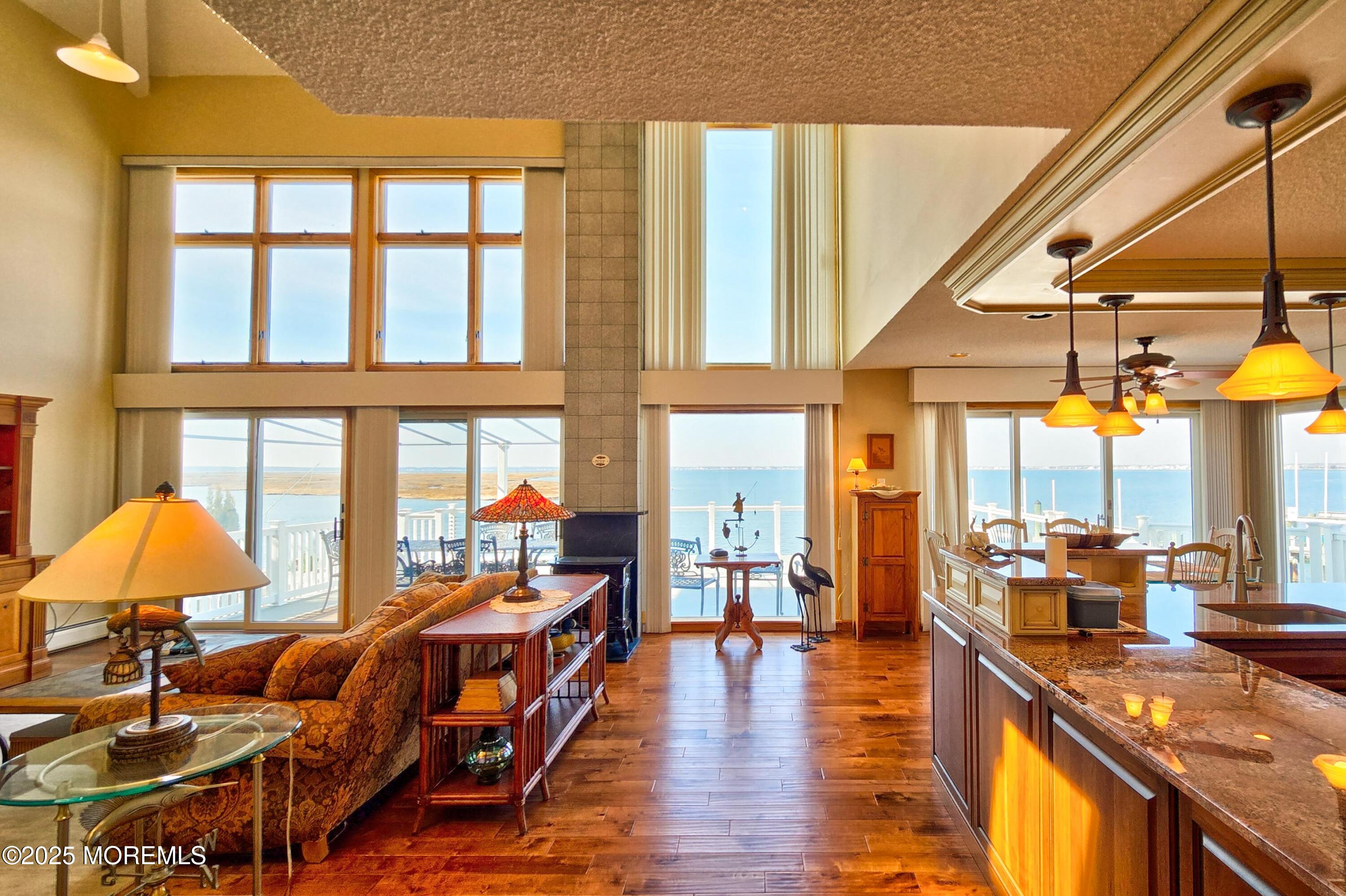 495 Boca Raton Drive Lavallette, NJ 08735 - Photo 12 of 48 a view of a living room with furniture and chandelier