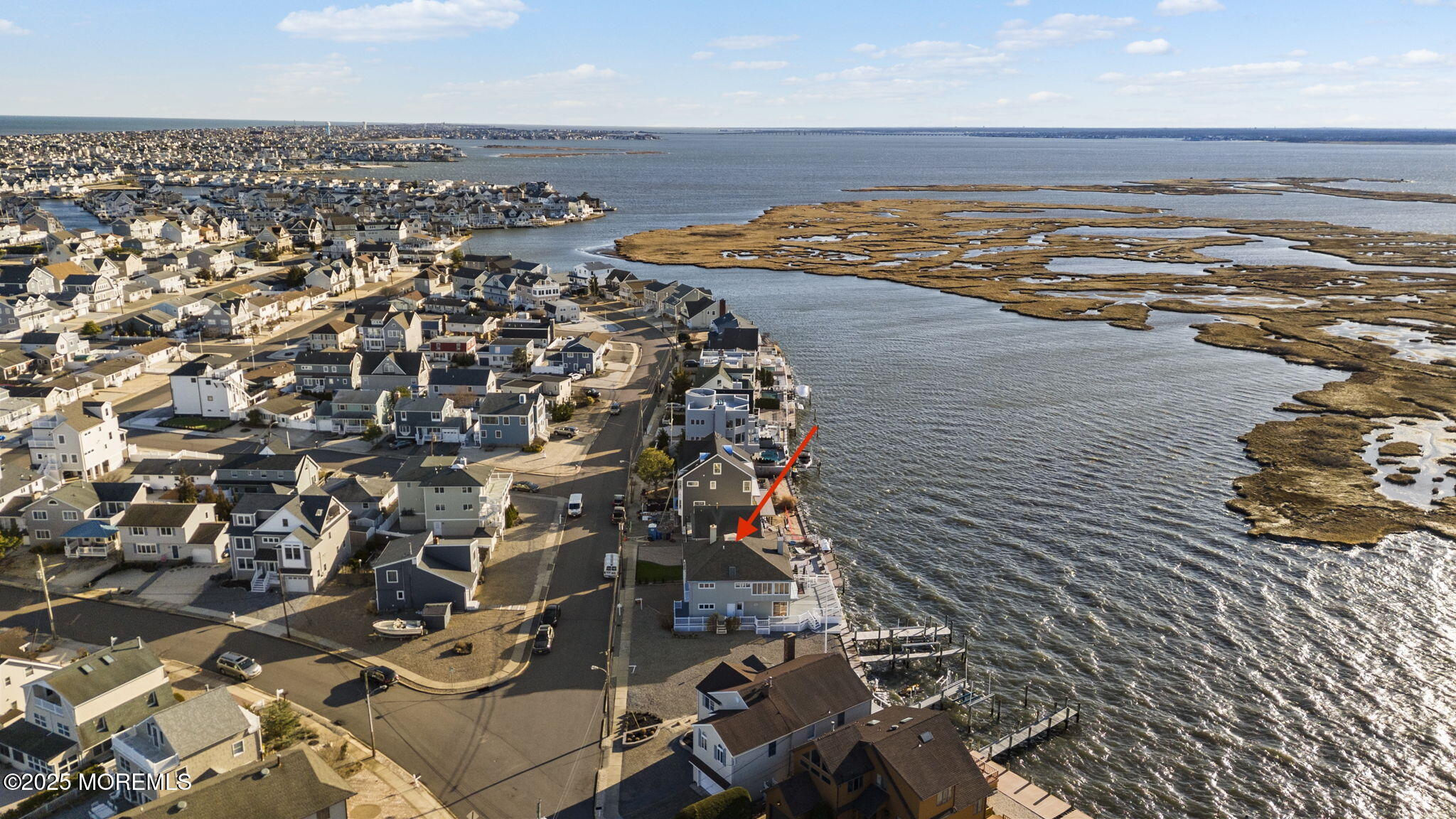 495 Boca Raton Drive Lavallette, NJ 08735 - Photo 40 of 48 a view of an ocean and a building