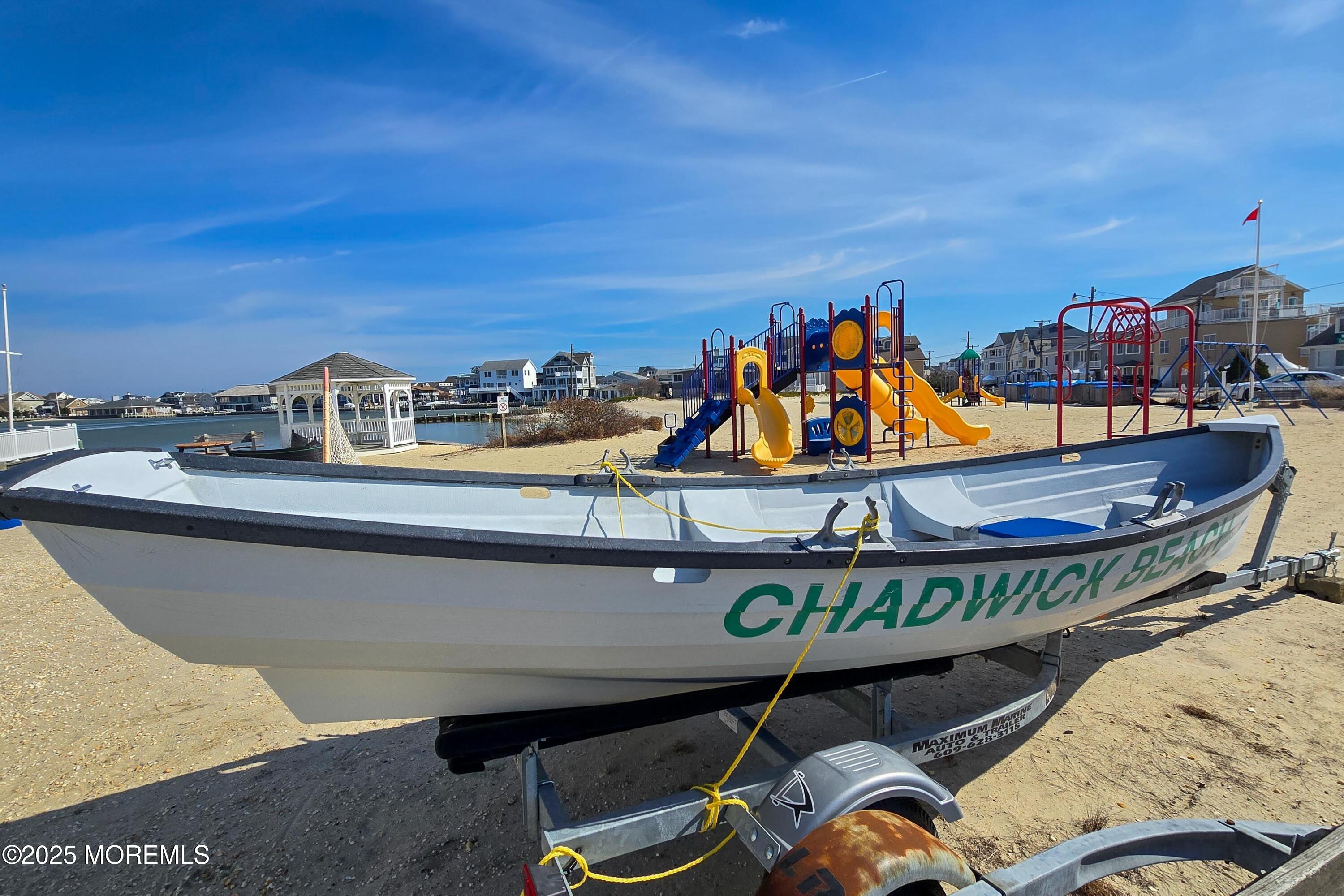 495 Boca Raton Drive Lavallette, NJ 08735 - Photo 47 of 48 a view of a chairs and table in patio