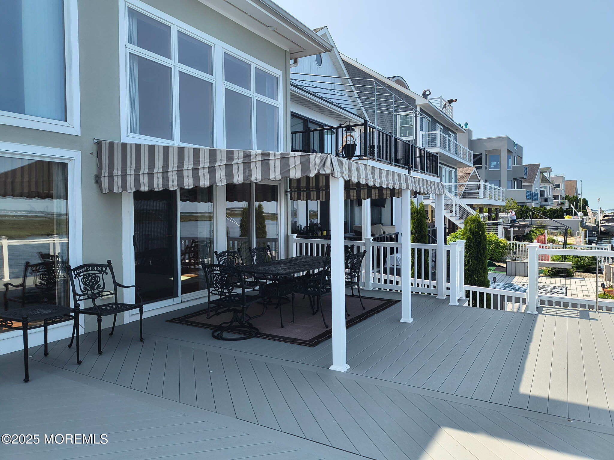 495 Boca Raton Drive Lavallette, NJ 08735 - Photo 6 of 48 a front view of a building with street view