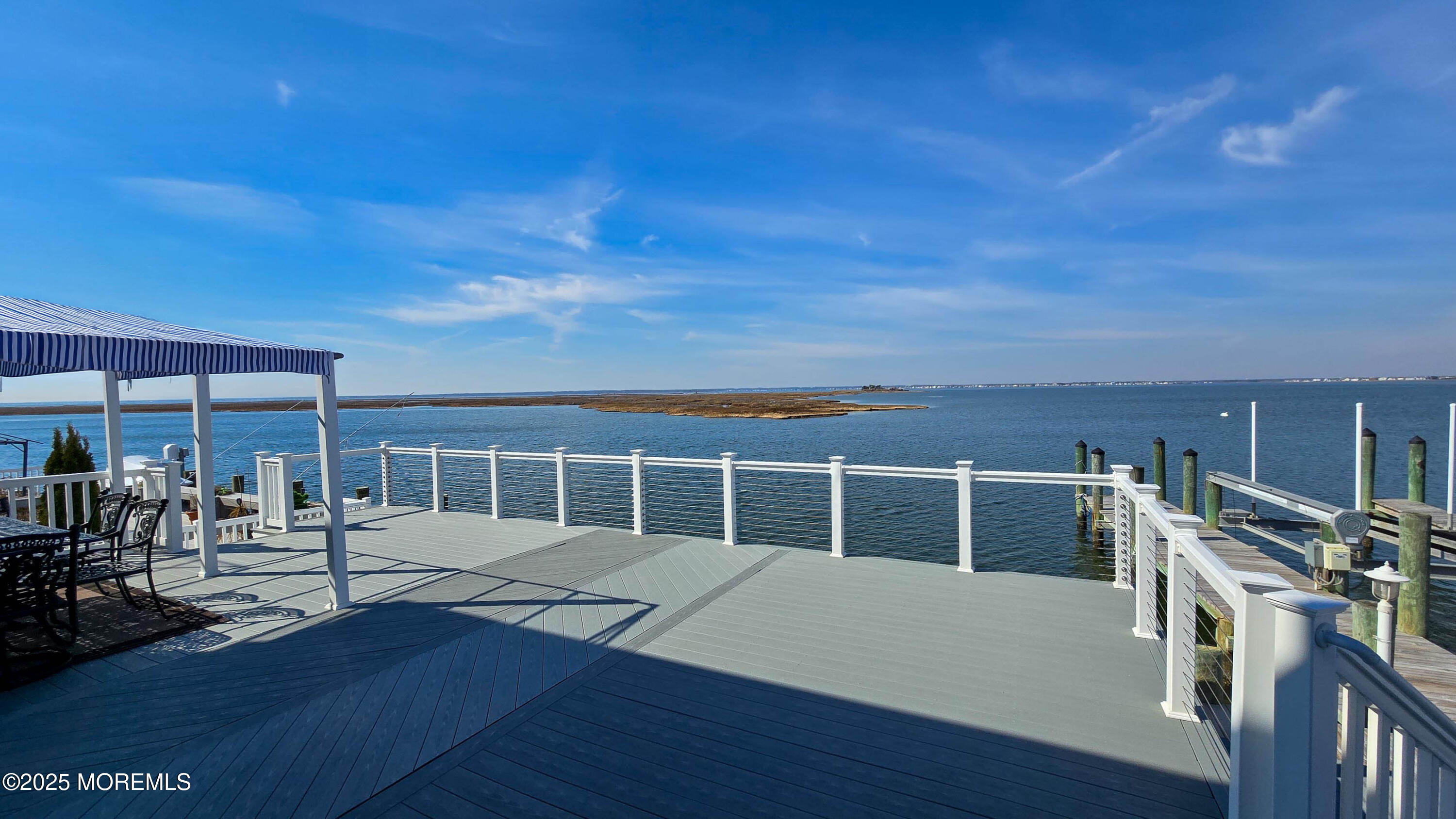 495 Boca Raton Drive Lavallette, NJ 08735 - Photo 7 of 48 a view of a dining room with furniture window and wooden floor