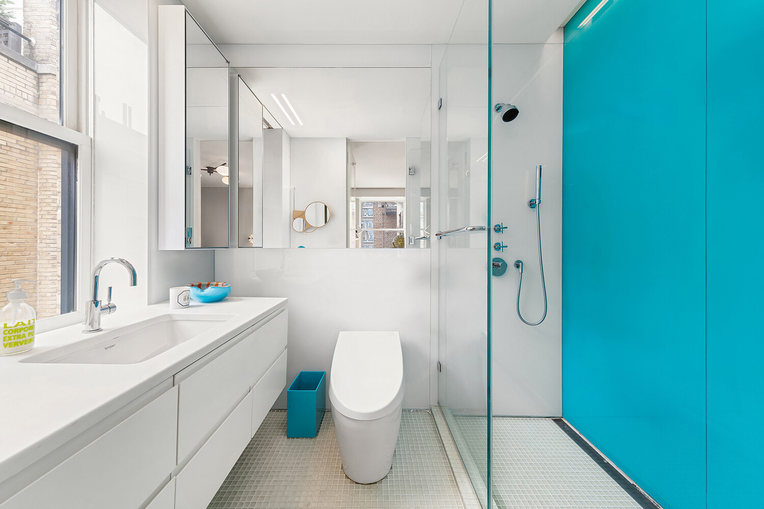 812 Park Avenue, Unit PHA Manhattan, NY 10021 - Photo 13 of 14 a bathroom with a sink a toilet and shower