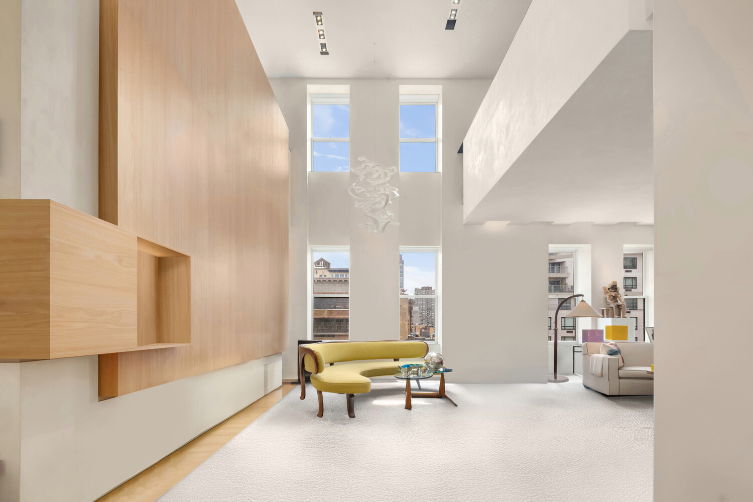 812 Park Avenue, Unit PHA Manhattan, NY 10021 - Photo 2 of 14 a living room with furniture and a window