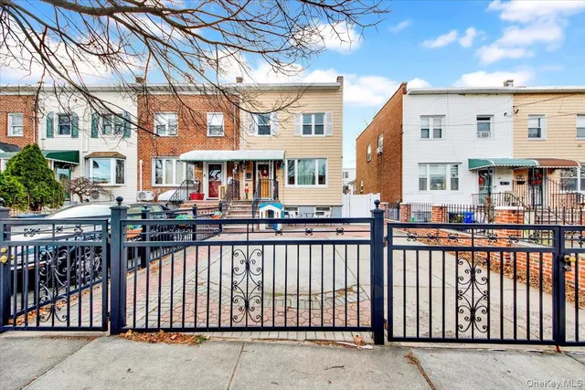 a front view of a building with glass windows