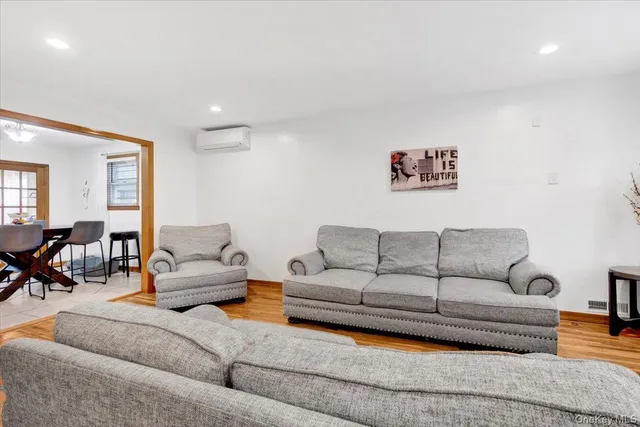 a living room with furniture and a couch