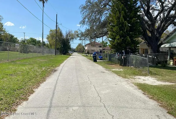 a view of a patio with a yard