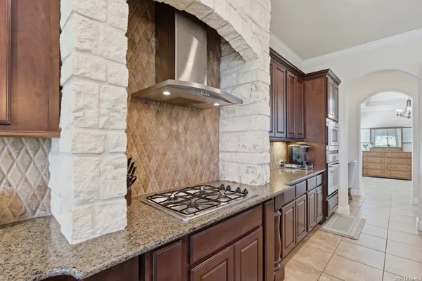 a kitchen with sink and window