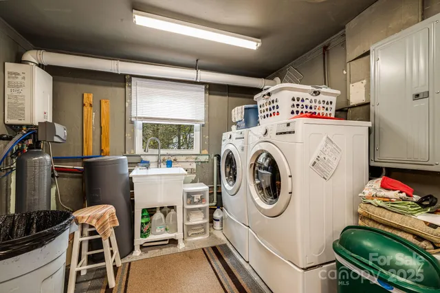 a view of yard with large trees