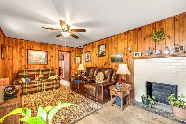 a kitchen with granite countertop a sink appliances and cabinets
