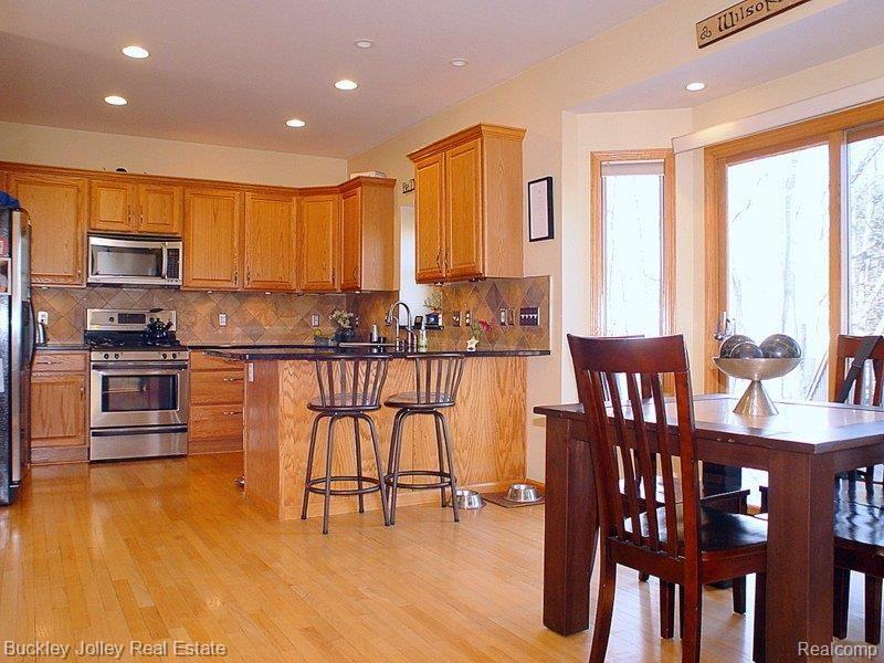 8445 Lee Road Brighton, MI 48116 - Photo 8 of 24 Oak Cabinetry.jpg