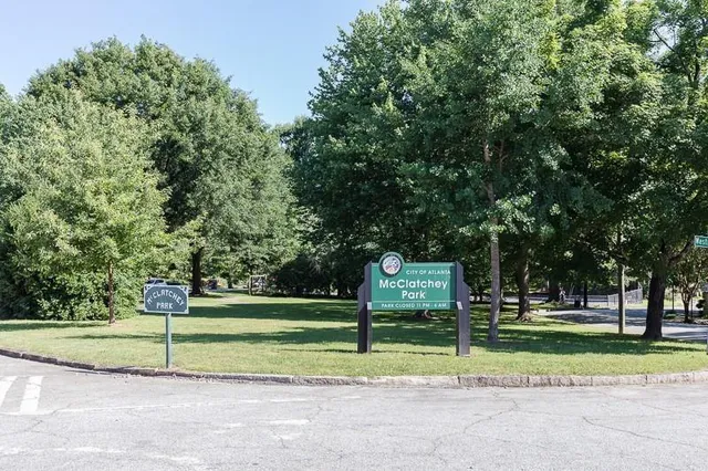 a front view of a house with yard