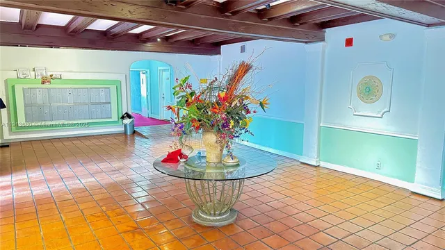 a vase of flowers sitting on a table