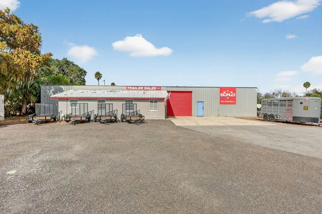 a view of swimming pool with a yard and seating area