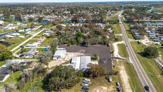 a view of empty room with wooden ceiling