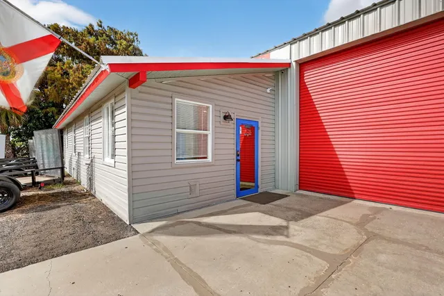 a view of parking garage with cars