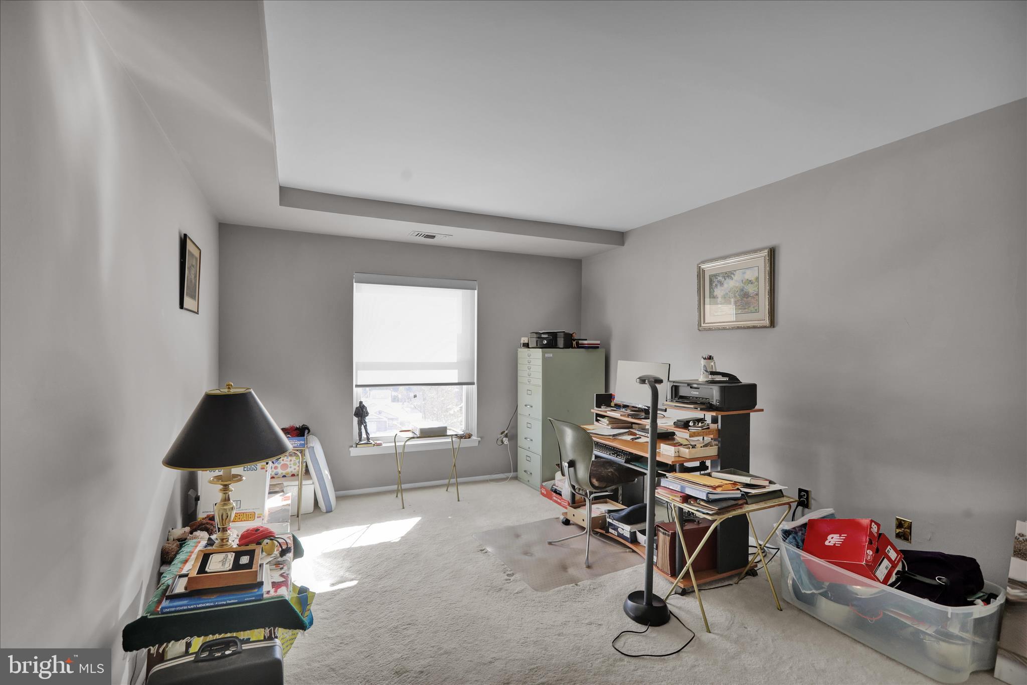 1375 Pershing Boulevard, Unit 201 Reading, PA 19607 - Photo 14 of 24 a view of a workspace with furniture and a window