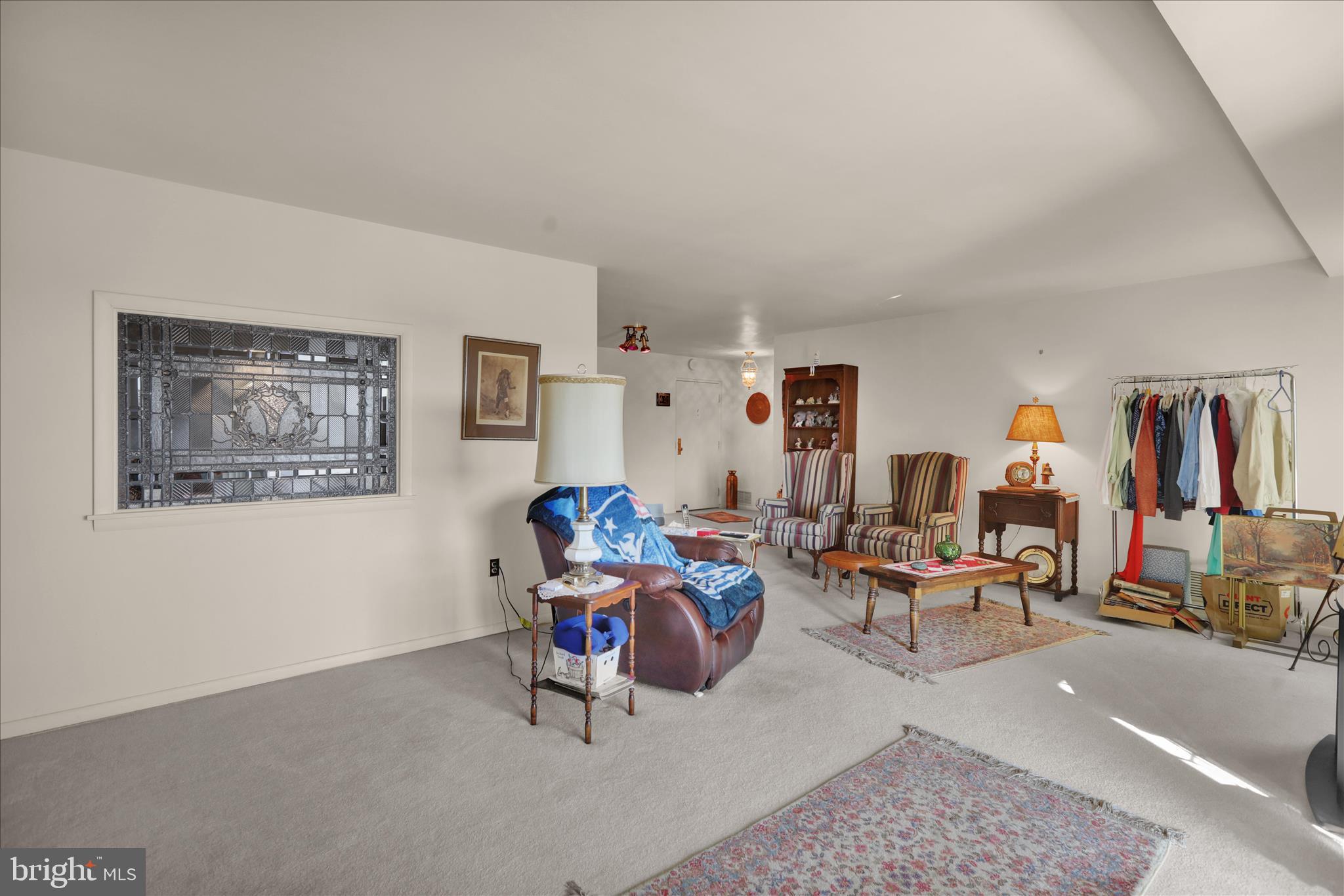 1375 Pershing Boulevard, Unit 201 Reading, PA 19607 - Photo 19 of 24 a living room with furniture and a large window