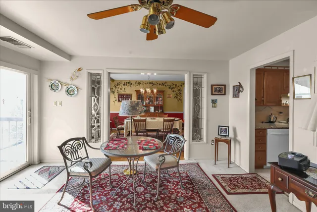a view of a dining room with furniture window and outside view