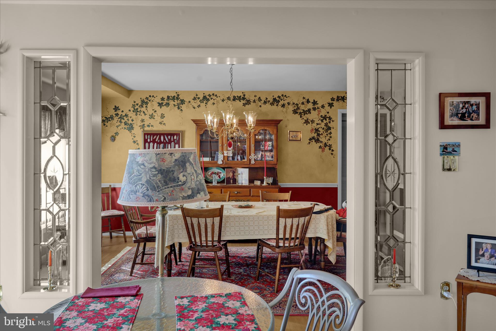 1375 Pershing Boulevard, Unit 201 Reading, PA 19607 - Photo 6 of 24 a view of a dining room with furniture and chandelier