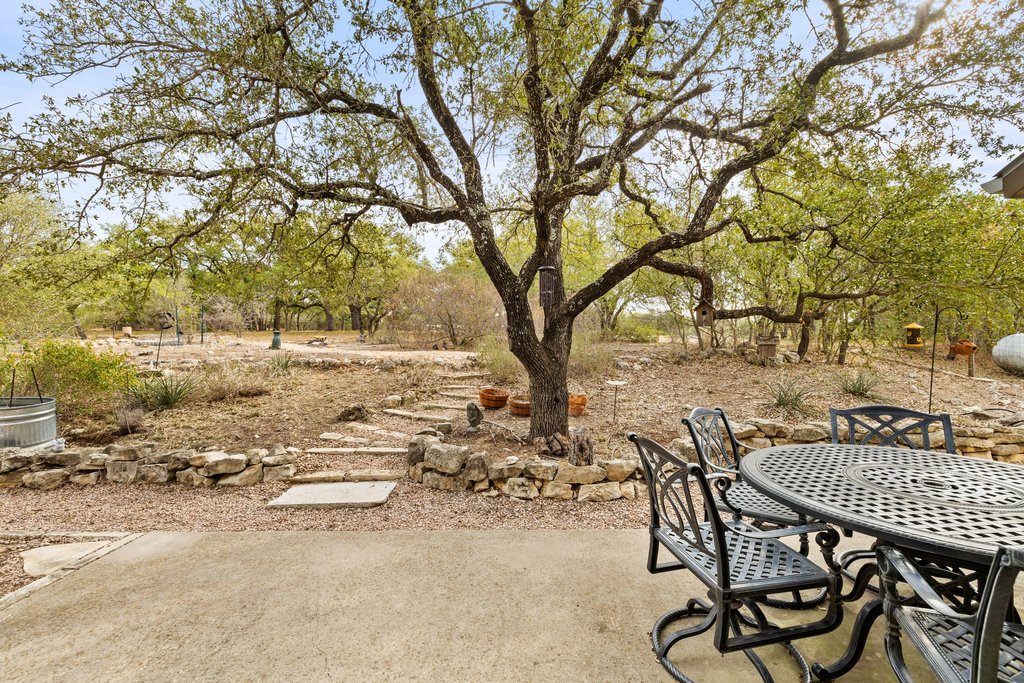 232 Crooked Oak Round Mountain, TX 78663 - Photo 28 of 40 View of patio with outdoor dining area