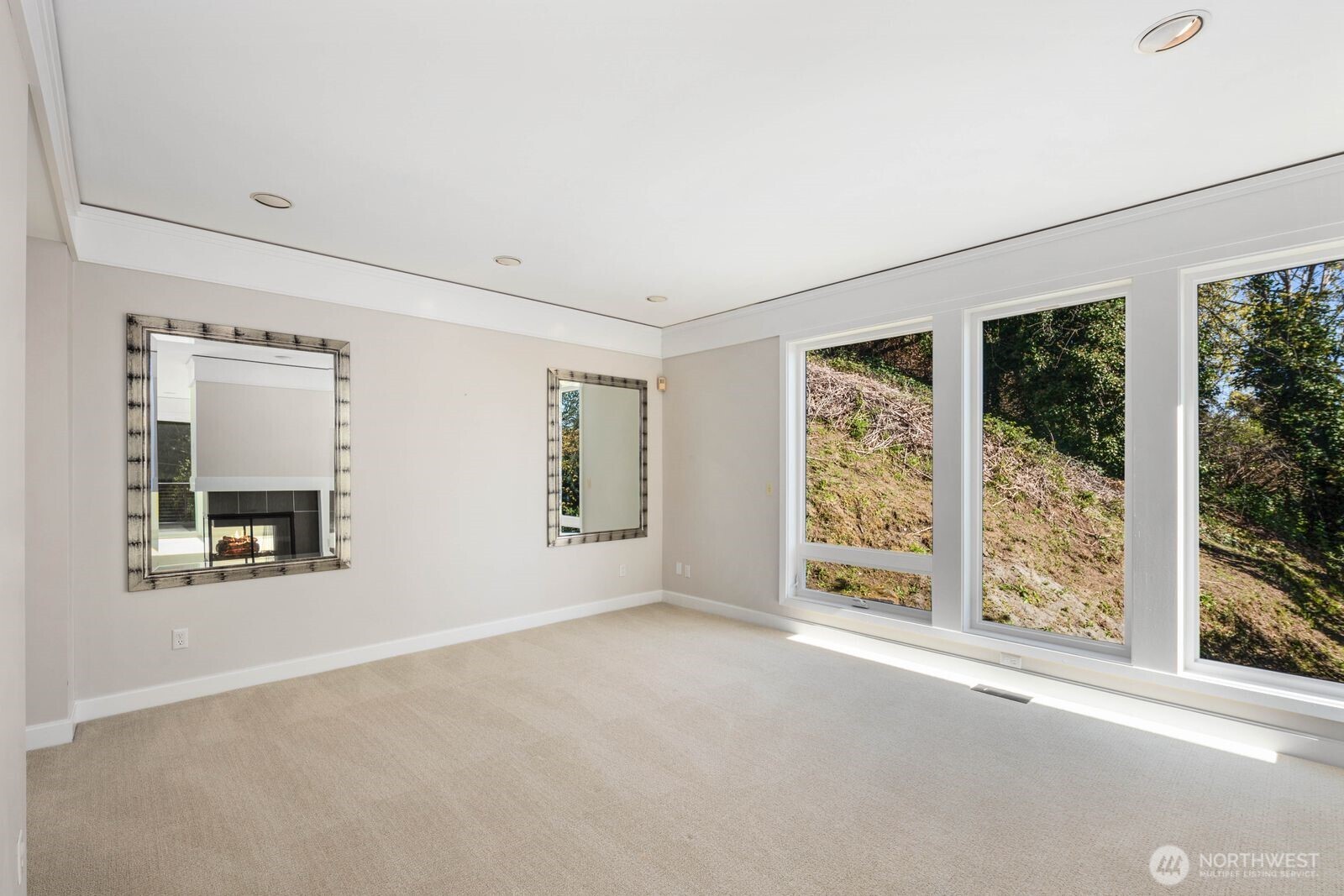 1717 Ferry Avenue Southwest Seattle, WA 98116 - Photo 16 of 40 an empty room with windows