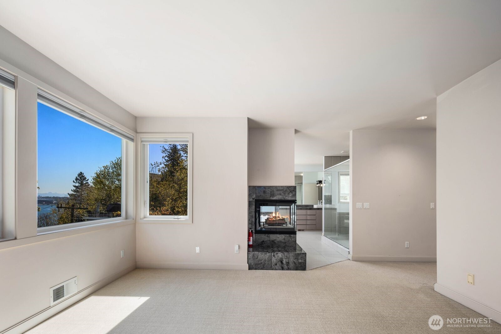 1717 Ferry Avenue Southwest Seattle, WA 98116 - Photo 29 of 40 a living room with stainless steel appliances kitchen island granite countertop a refrigerator and cabinets