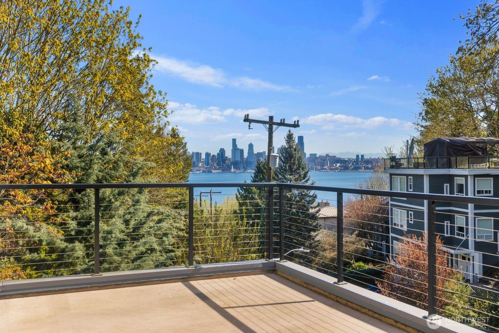 1717 Ferry Avenue Southwest Seattle, WA 98116 - Photo 3 of 40 a view of ocean from a balcony