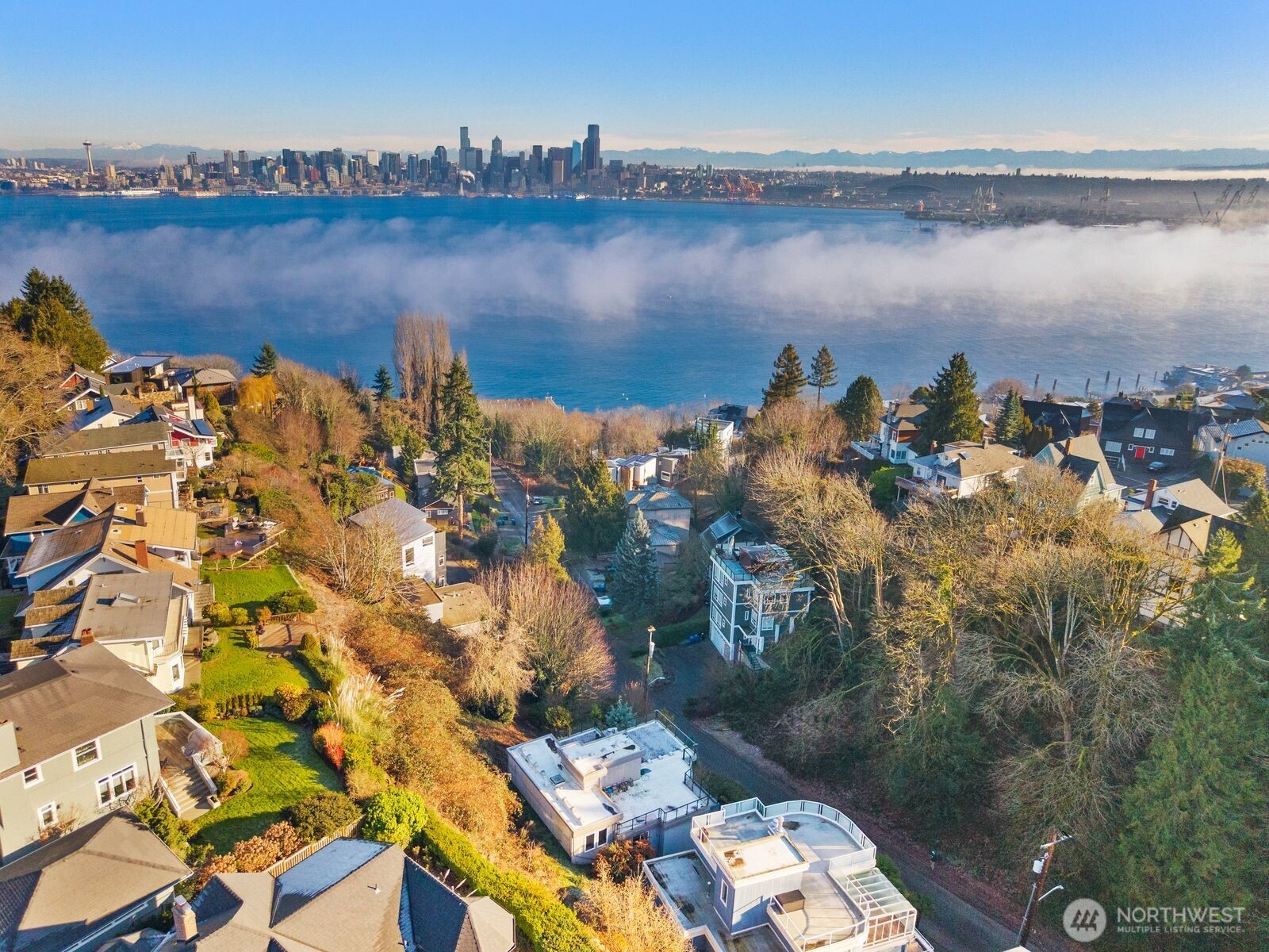 1717 Ferry Avenue Southwest Seattle, WA 98116 - Photo 37 of 40 a view of a lake with lawn chairs