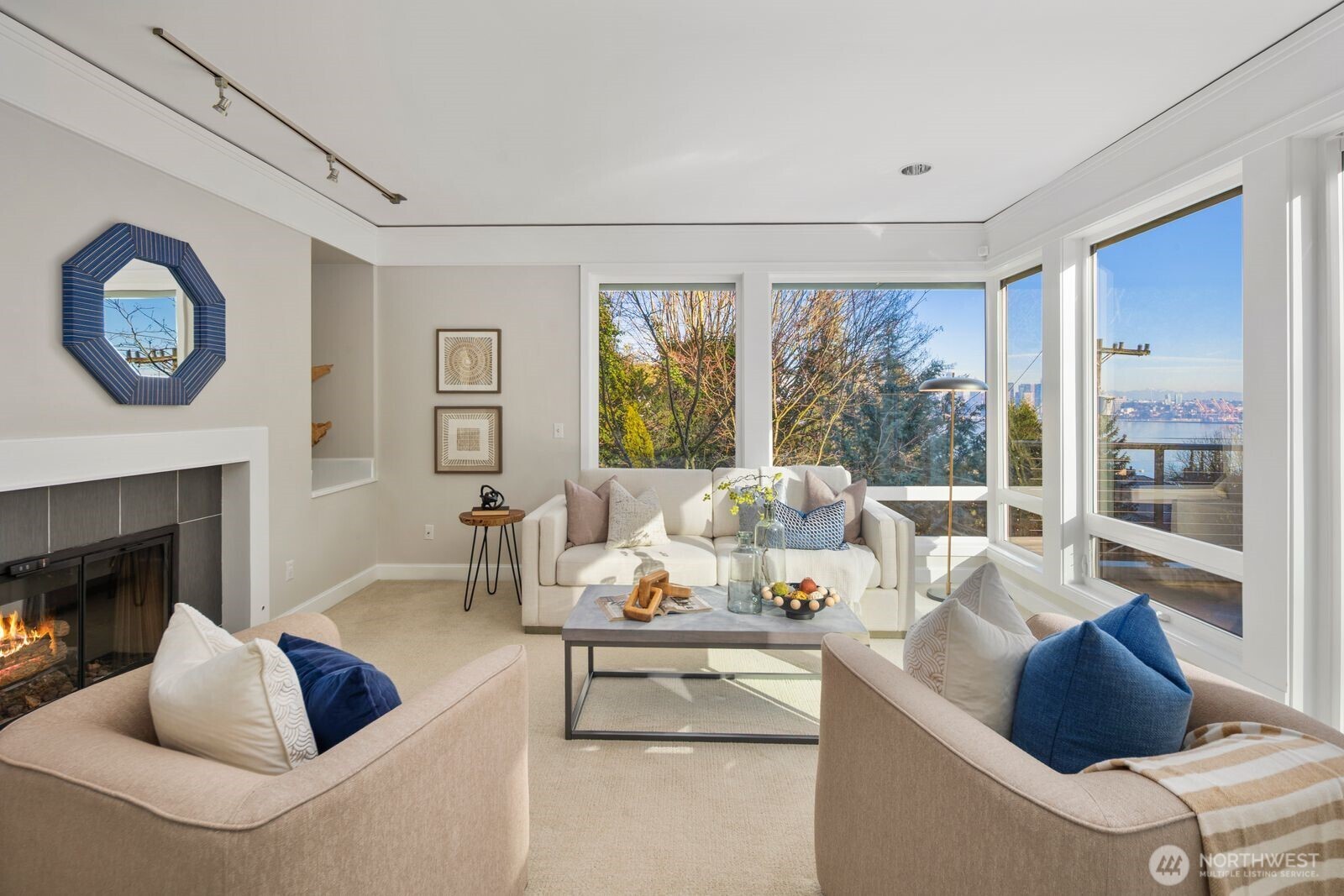 1717 Ferry Avenue Southwest Seattle, WA 98116 - Photo 9 of 40 a living room with furniture and a fireplace