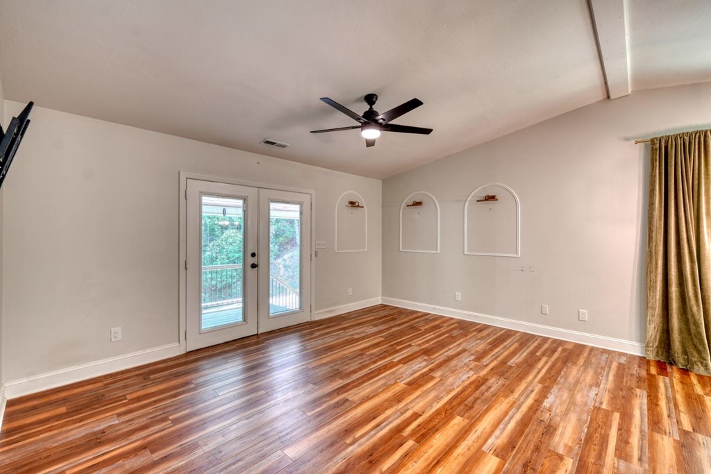 45 Mountain Stream Road Murphy, NC 28906 - Photo 30 of 33 a view of empty room with wooden floor and fan