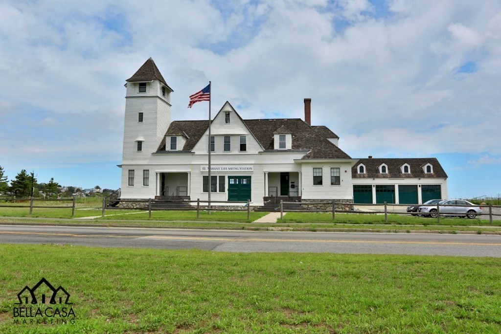 8 Castle Road Nahant, MA 01908 - Photo 28 of 32 a front view of a building with a garden