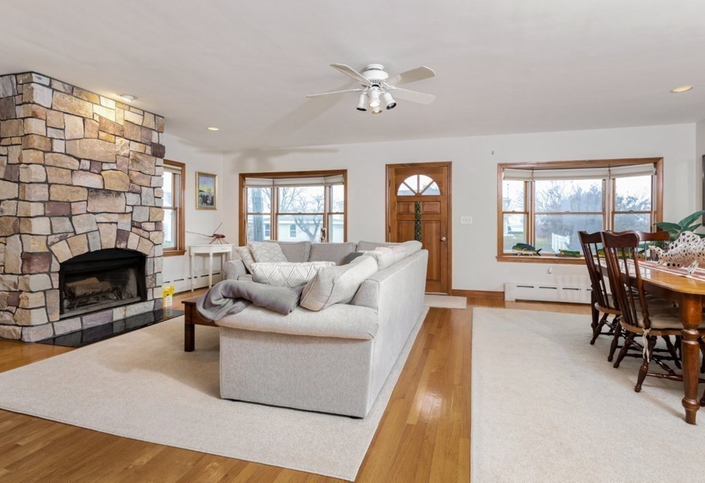 8 Castle Road Nahant, MA 01908 - Photo 6 of 32 a living room with furniture and a fireplace