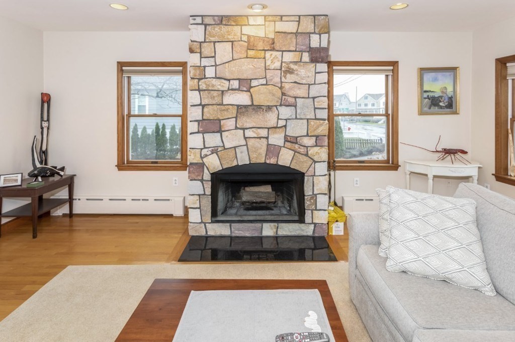 8 Castle Road Nahant, MA 01908 - Photo 9 of 32 a living room with furniture and a fireplace