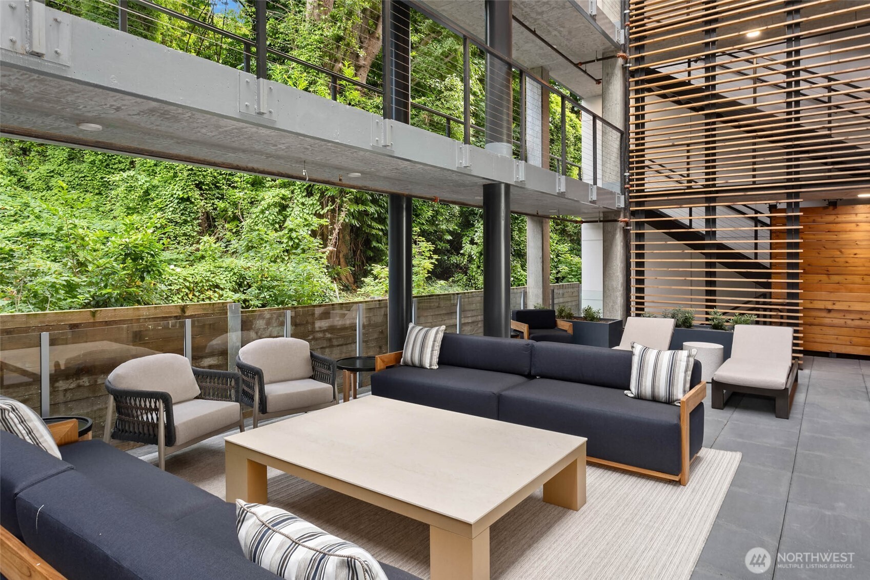 1250 Alki Avenue Southwest, Unit 3H Seattle, WA 98116 - Photo 36 of 38 a view of an outdoor space with seating