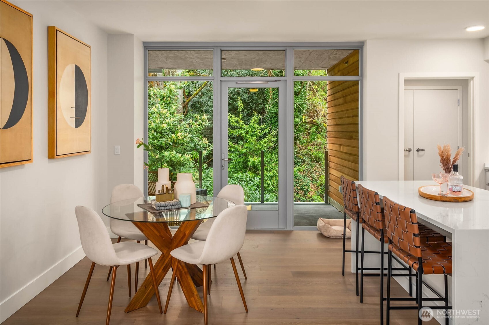 1250 Alki Avenue Southwest, Unit 3H Seattle, WA 98116 - Photo 4 of 38 a view of a dining room with furniture window and outside view