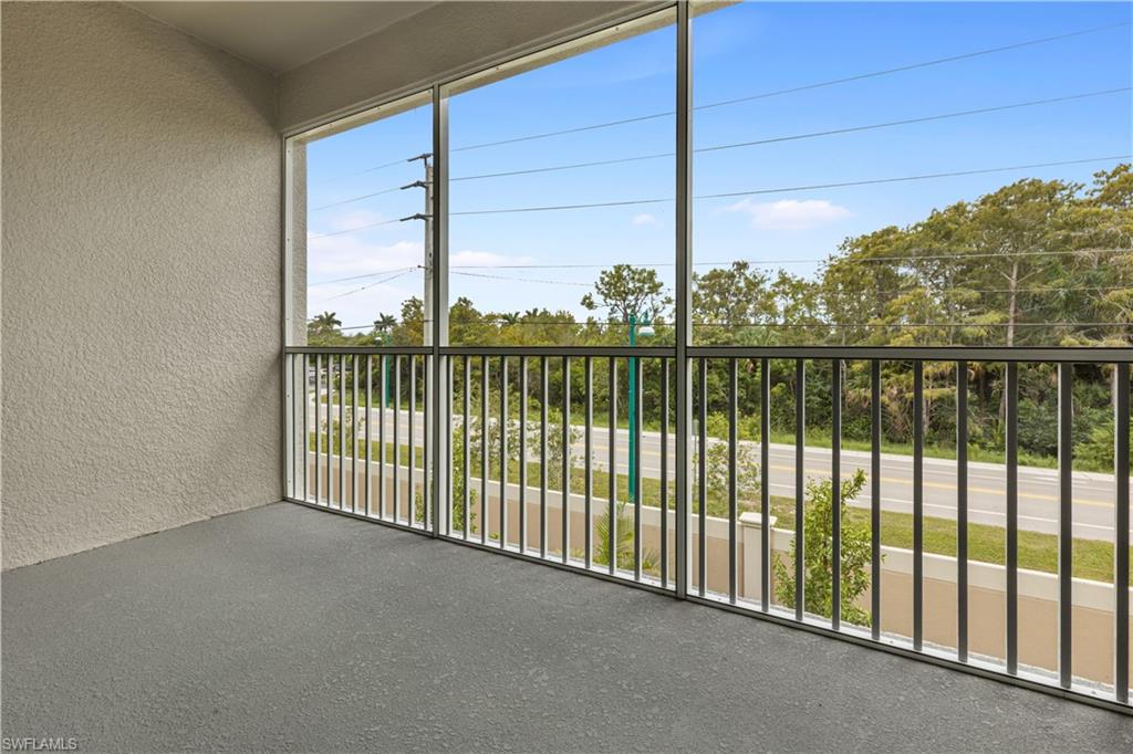 4670 Arboretum Circle, Unit 203 Naples, FL 34112 - Photo 9 of 33 a view of a balcony