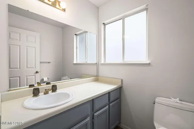 a bathroom with a sink and a toilet