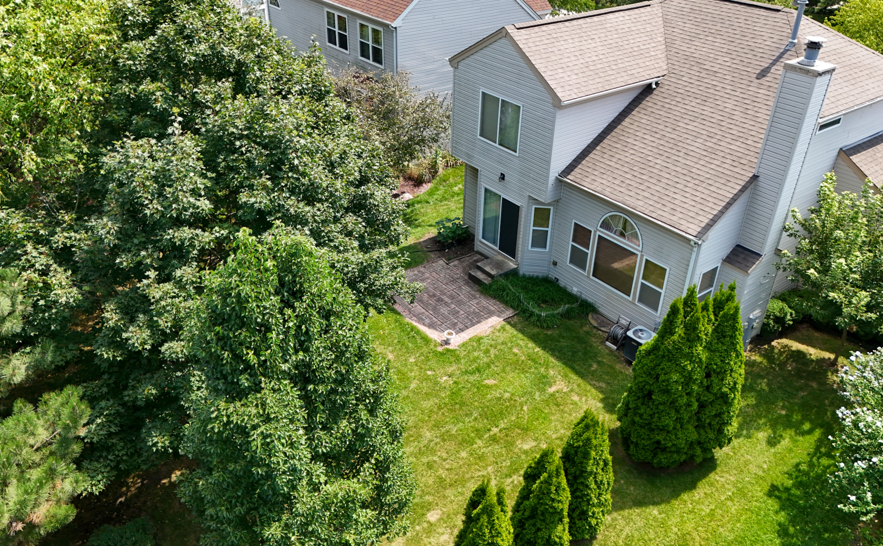 808 Violet Circle Naperville, IL 60540 - Photo 20 of 31 a aerial view of a house with a yard and potted plants