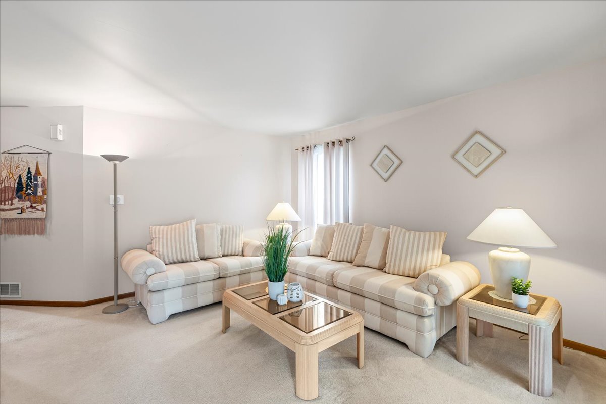 808 Violet Circle Naperville, IL 60540 - Photo 2 of 31 a living room with furniture and a couch