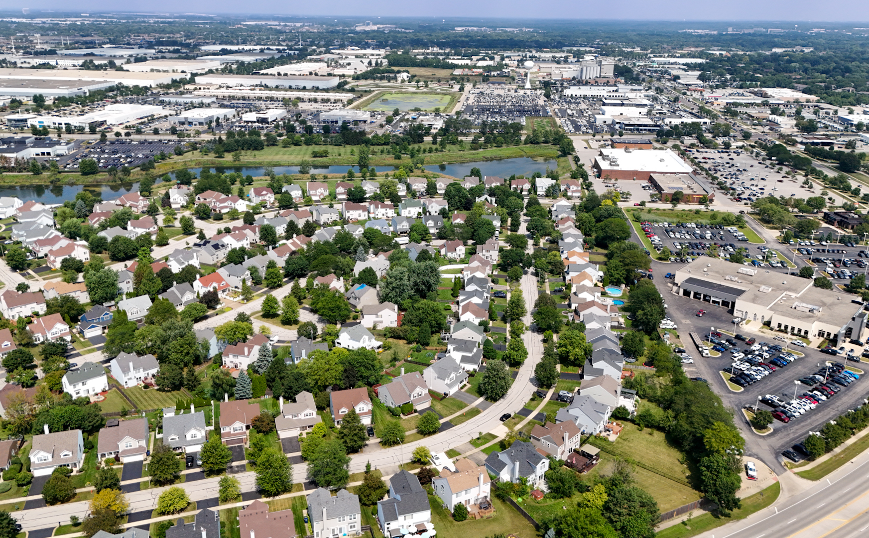 808 Violet Circle Naperville, IL 60540 - Photo 23 of 31 an aerial view of a city with lots of residential buildings