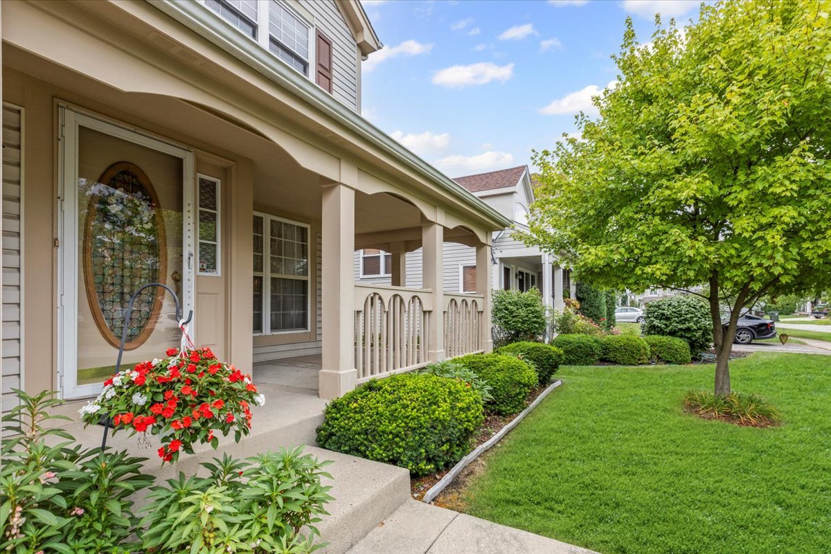 808 Violet Circle Naperville, IL 60540 - Photo 27 of 31 a front view of a house with a yard