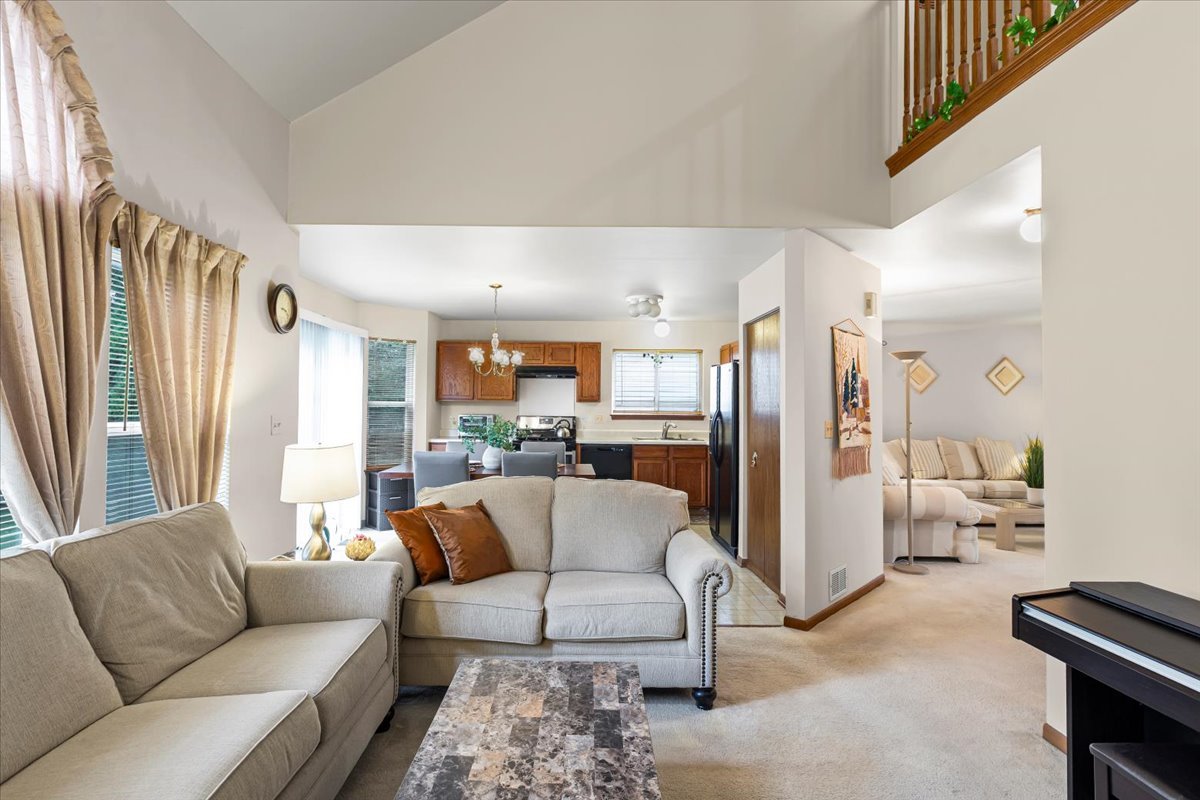 808 Violet Circle Naperville, IL 60540 - Photo 6 of 31 a living room with furniture and a large window
